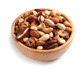 Bowl with mixed organic nuts on white background