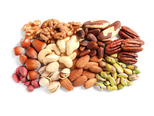 Pile of mixed organic nuts on white background