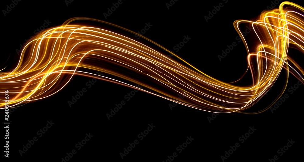 Wall mural long exposure light painting photography, curvy lines of vibrant neon metallic yellow gold against a