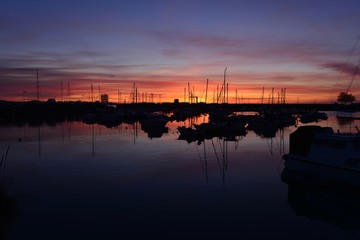 St Aubins harbour, Jersey, U.K.
Calm Winter sunrise.