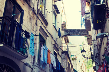 Fototapeta na wymiar Old facades in a narrow alley of old town Amalfi