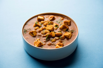 Chole Paneer curry made using boiled chickpea with cottage cheese with spices. Popular North Indian recipe. served in a bowl or serving pan. Selective focus