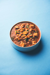 Chole Paneer curry made using boiled chickpea with cottage cheese with spices. Popular North Indian recipe. served in a bowl or serving pan. Selective focus