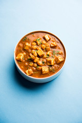 Chole Paneer curry made using boiled chickpea with cottage cheese with spices. Popular North Indian recipe. served in a bowl or serving pan. Selective focus