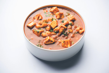 Chole Paneer curry made using boiled chickpea with cottage cheese with spices. Popular North Indian recipe. served in a bowl or serving pan. Selective focus