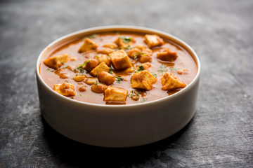 Chole Paneer curry made using boiled chickpea with cottage cheese with spices. Popular North Indian recipe. served in a bowl or serving pan. Selective focus