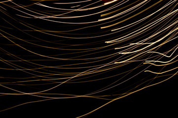 Abstract background of long explosure tale golden light