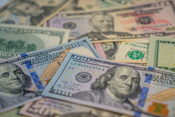 background of various US dollar banknotes
