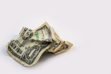 Crumpled up One Dollar Banknote on white background