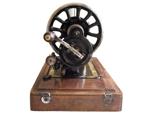 Obraz premium Vintage hand sewing machine, selective focus, cutout, isolated on white