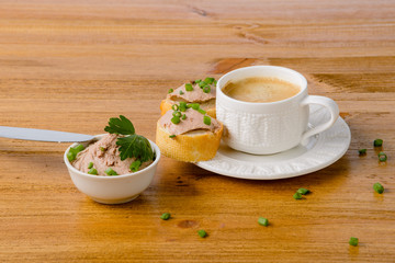 healthy breakfast with coffee and sandwiches, on a wooden table