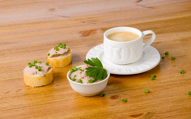 healthy breakfast with coffee and sandwiches, on a wooden table