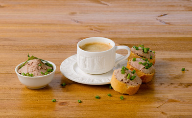 healthy breakfast with coffee and sandwiches, on a wooden table