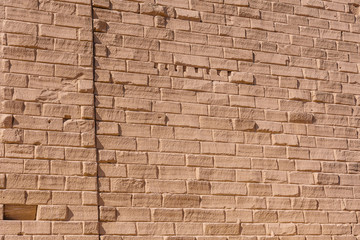 Background of the ancient brick wall in a Karnak temple. Luxor, Egypt.