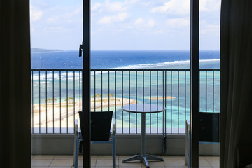 Hotel room with ocean view. The window overlooking the ocean.