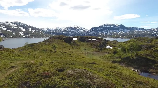 aerial view of beautiful mountainside at western norway with a big lake