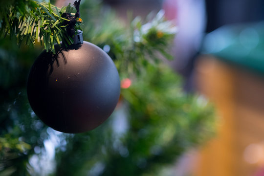Black christmas ornaments hanging