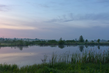 Obraz na płótnie Canvas Early morning on the lake