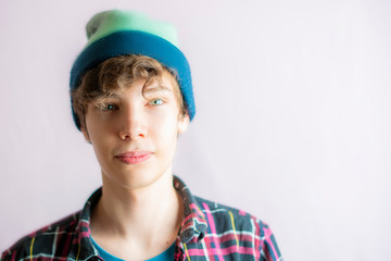 portrait of young handsome male put on and wear hat isolated  f