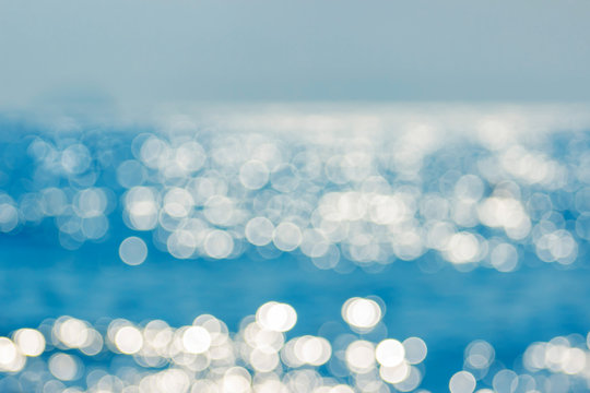 Fototapeta Blur tropical sea water bokeh. Abstract sea water bokeh