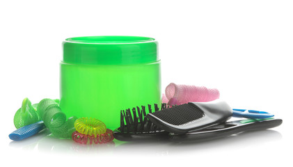 Various hair care products and various hair accessories on a white isolated background. hair cosmetics