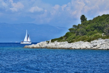 Greece,island Paxos-sailboat off the coast of Mongonisi