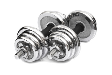 Obraz premium a pair of adjustable dumbbells isolated on white background
