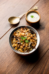 Keema or Kheema Biryani - Fragrant and spicy minced lamb or goat or chicken cooked in range of aromatic spices with basmati rice. served in a karahi with curd. selective focus