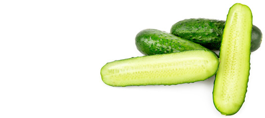 Ripe green cucumbers isolated on white background. Free space for text. Wide photo.