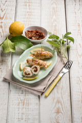 turkey rolled up with dried tomato sage and oregano
