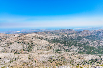 Fototapeta na wymiar Panoramic skyline view overlooking Heraklion city coastline, Aegean Sea Dragon Island, known as Dia. Mountaineering trekking paradise, at 2000m high on Psiloritis mountains. Heraklion, Crete Greece
