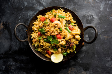 Kheema Pulao - Rice cooked with mutton or chicken mince with vegetables and spices. served in a...