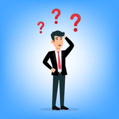 Businessman confused and question marks