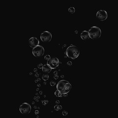 White air bubbles isolated on black background. Underwater oxygen. Soap closeup.