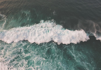 Fototapeta na wymiar Aerial view of huge ocean wave. Drone Photo