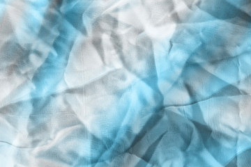 Ocean blue textile background. Silk cloth texture. Fabric jeans pattern.