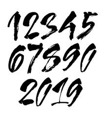 set of calligraphic acrylic or ink numbers. ABC for your design, brush lettering on a black background