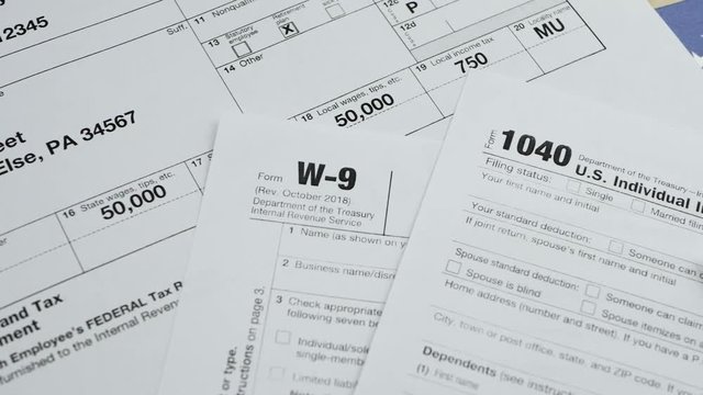American 1040 Individual Income Tax return form. Revenue service The Internal Revenue Service (IRS) of the United States federal government concept