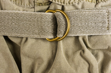 clothing items washed cotton fabric texture with seams, clasps, buttons and rivets