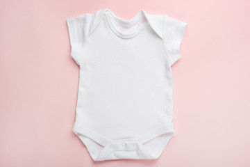 Layout Flat Lay white baby shirt bodysuit, on a pink background, for girls. Mock up for design and...