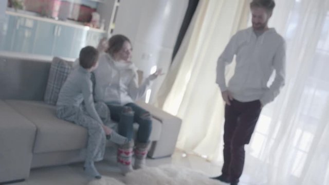 Young parents arguing and disperse to different rooms. The little boy is scared and at a loss. Family relationships. Family problems. Slow motion.