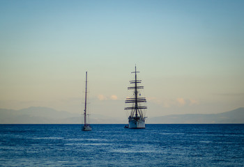 sailing vessel near amalfi coast at sunset