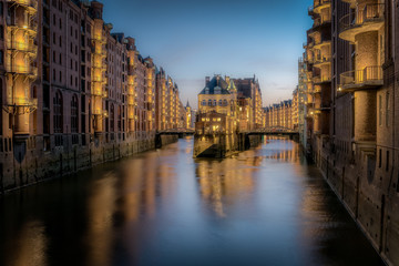 Fototapeta premium The Hamburg Warehouse District (Speicherstadt) is the world's largest historic warehouse complex, located in the Port of Hamburg, Germany. Concept: travel or sights