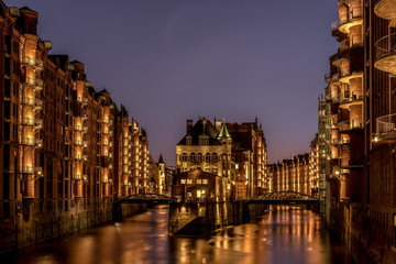 Fototapeta premium The Hamburg Warehouse District (Speicherstadt) is the world's largest historic warehouse complex, located in the Port of Hamburg, Germany. Concept: travel or sights