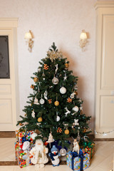 Home Christmas tree with gifts and toys