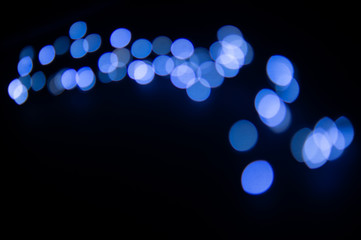 Blurred background with blue glows in bow shape