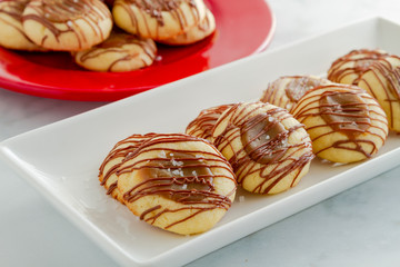 Salted caramel cookies drizzled with chocolate