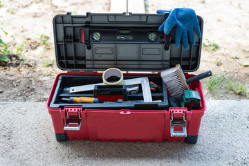 Plastic box with various building tools