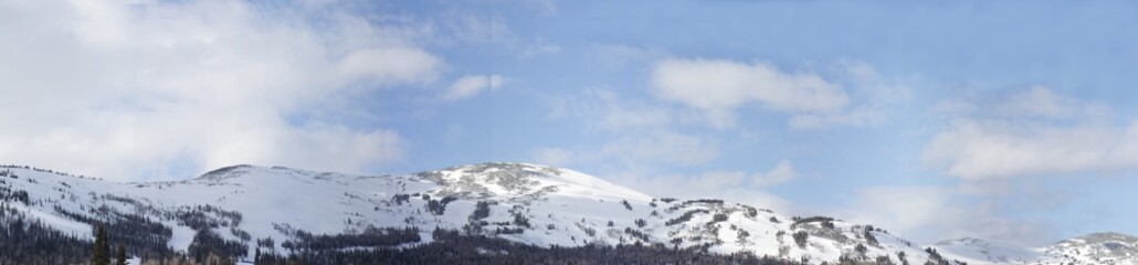 winter landscape with mountains and clouds