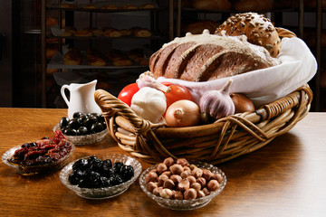 Basket with Freshly backed bread with various vegetables